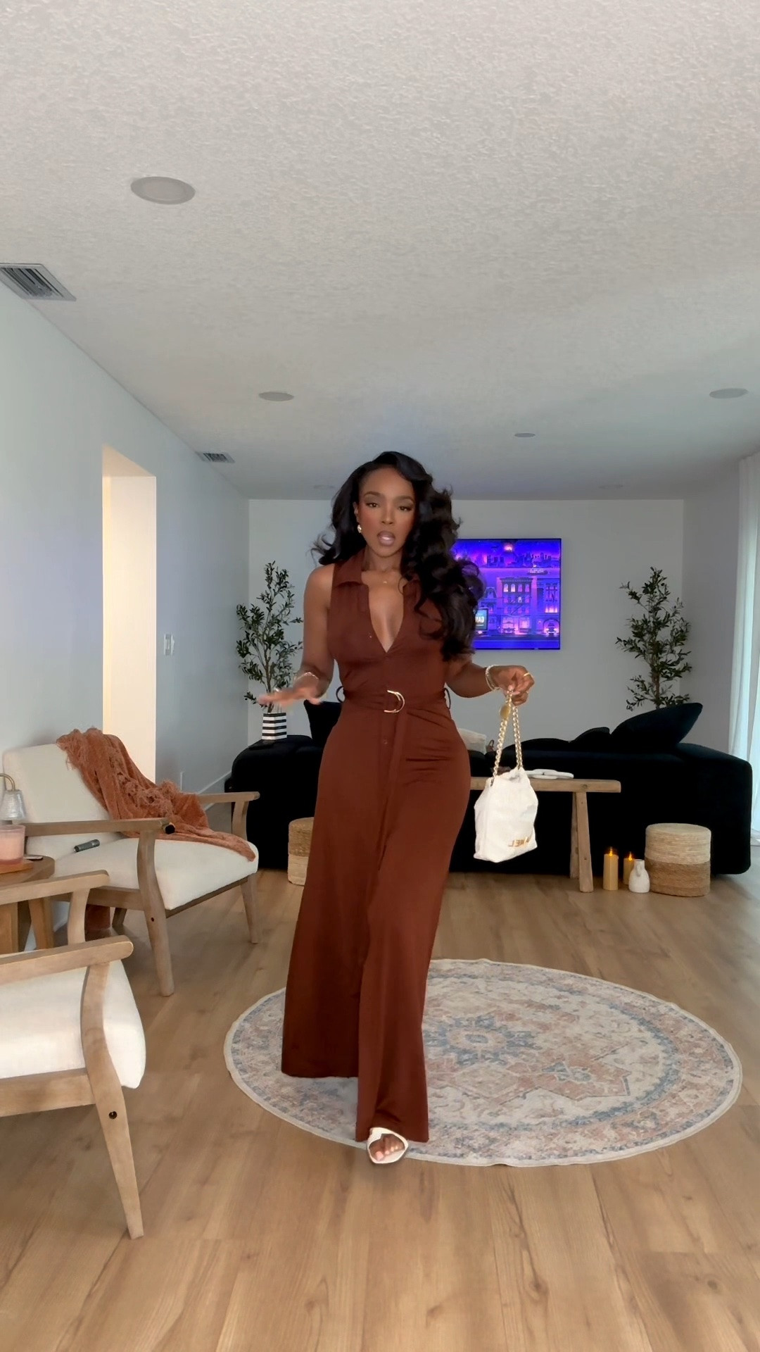 Hi Babes!

Chocolate brown is having such a moment right now and this dress is exactly why. The rich color, flattering waist detail, and flowy silhouette make it look far more expensive than it is. I love how the white accessories brighten everything up and give it that effortless vacation-luxury feel.

This is one of those dresses you can throw on and instantly feel polished. The front slit adds just enough movement while the belt detail creates a beautiful shape through the waist.

Where to wear this:
• Vacation dinners
• Resort getaways
• Summer date nights
• Brunch with the girls
• Cruise outfits
• Beachside restaurants
• Outdoor events

Undergarments: A nude seamless bra or adhesive cups work best with the neckline, paired with seamless nude underwear.

Everything is linked below.

xx Kira | IG: KirasFashionFinds

34D - 27 - 40 • Size Small or 4

Follow me on Instagram and YouTube @kirasfashionfinds