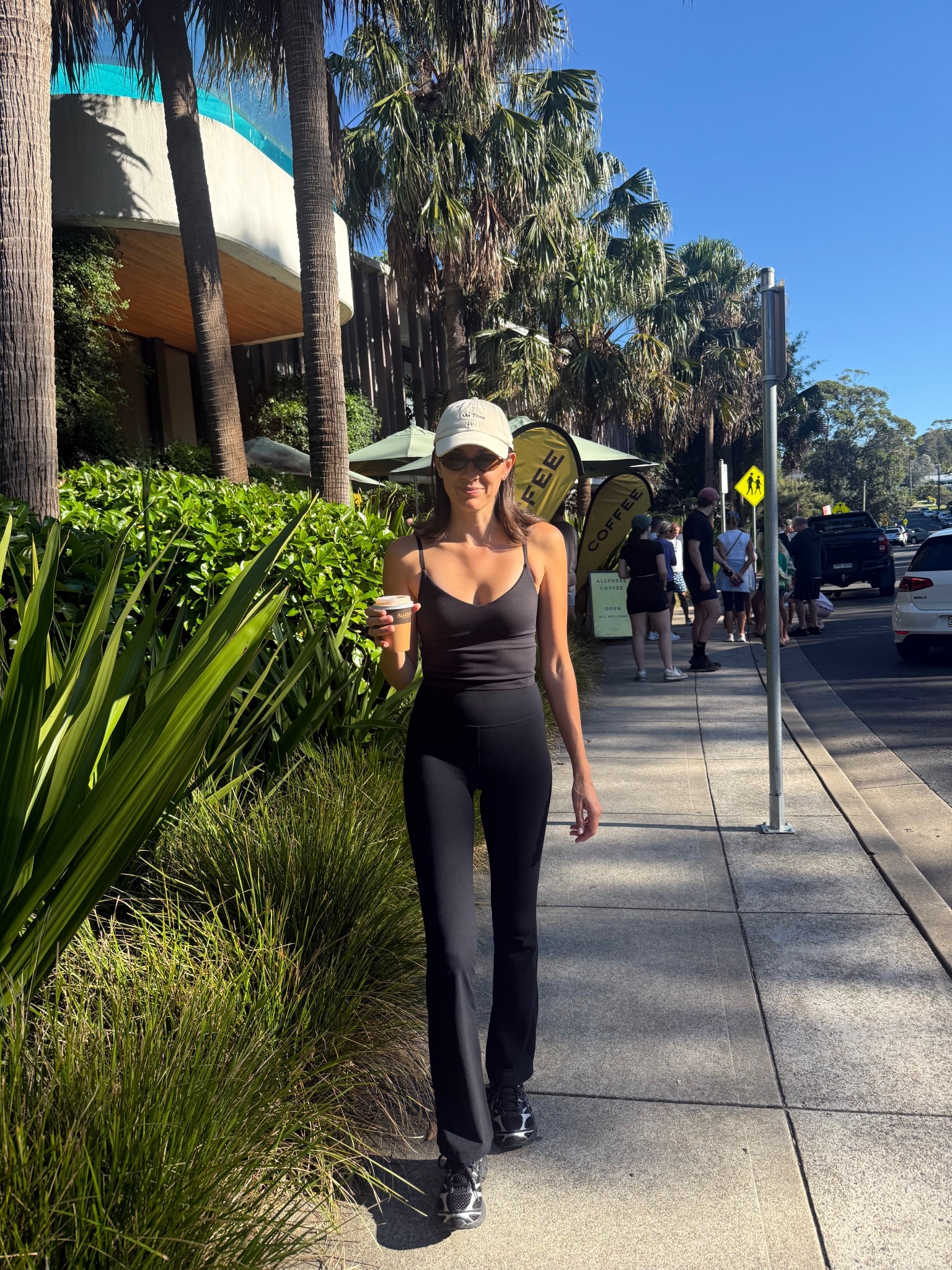What I wore for a walk to grab as a mum of two 🖤 Flares are from Nimble - I wear an XS. Tank is from Lululemon -
I wear a size 4. ASICS sneakers, Miu Miu sunglasses and a nimble cap. 