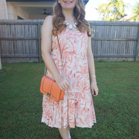 Orange andmore orange with this thrifted tiered palm print dress andmypale coral peachy Rebecca Minkoff small love bag 🧡

#LTKaustralia #LTKitbag