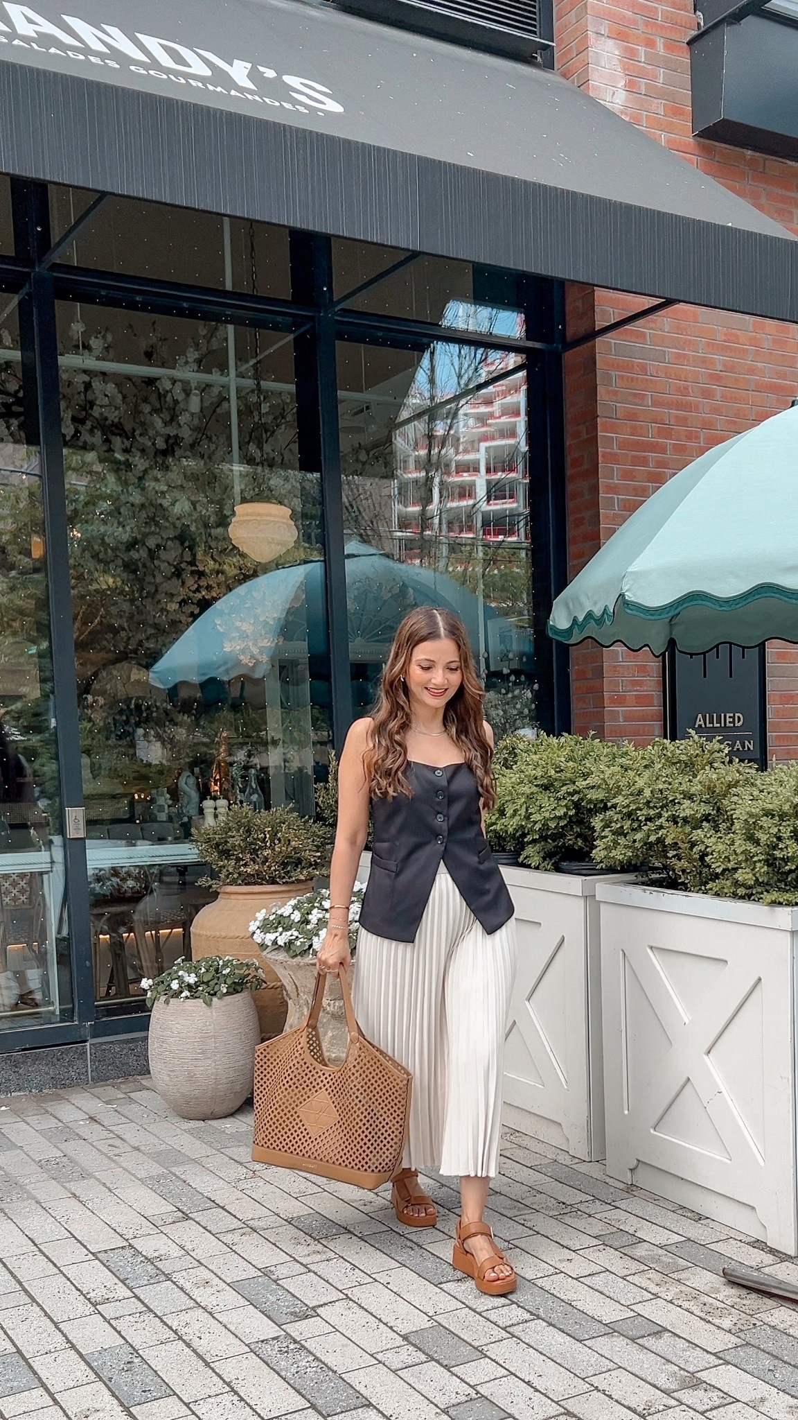 Black vest white skirt 

#LTKworkwear #LTKsummer #LTKcanada