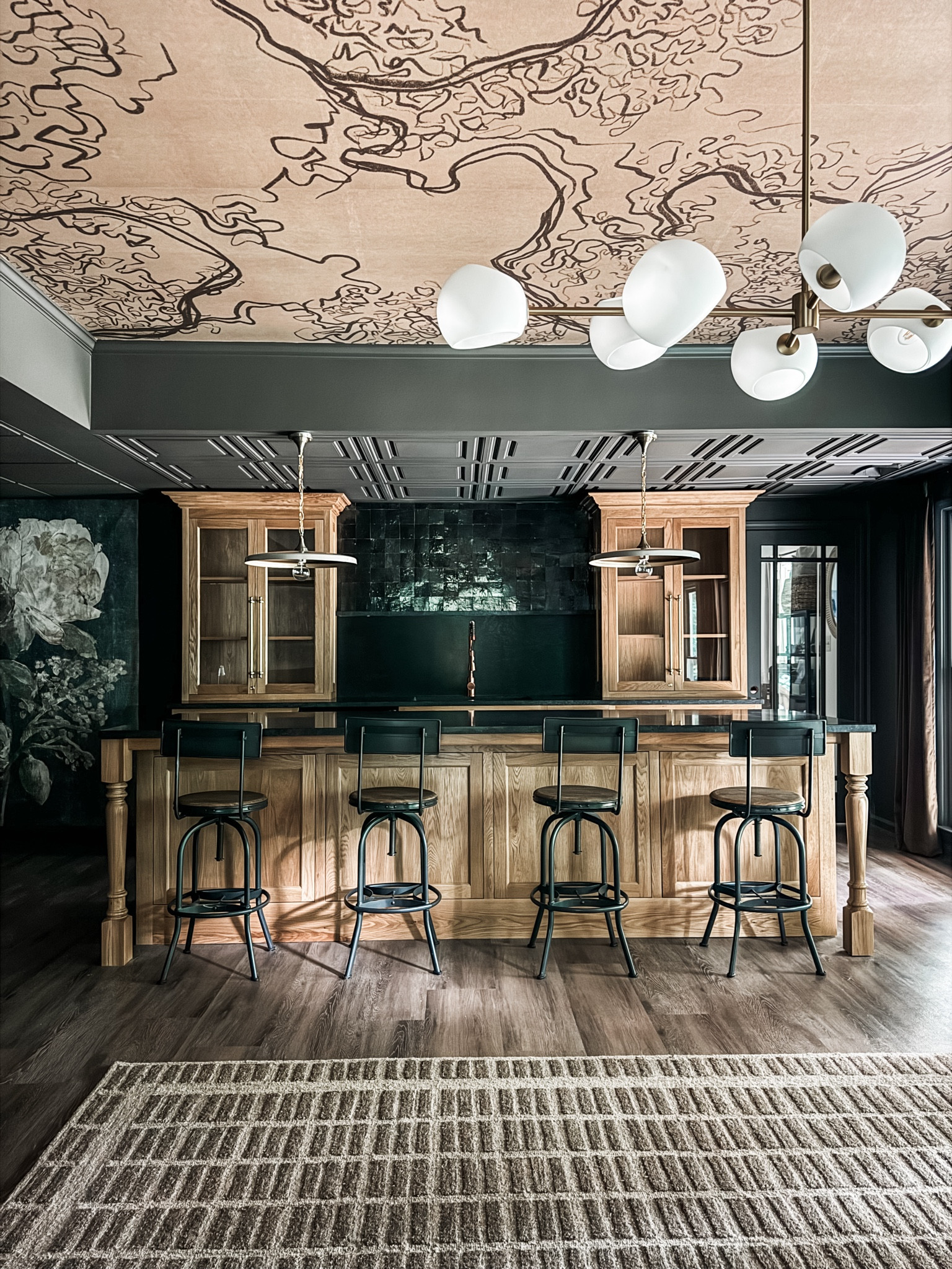 Moody basement bar vibes. 🖤

#barstools #arearug #chandelier #pendants #wallart #tapestry #walltapestry #cabinethardware #shadesoflight #rejuvination

#LTKStyleTip #LTKHome