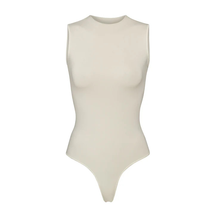 ESSENTIAL CREW NECK SLEEVELESS BODYSUIT | SKIMS (US)