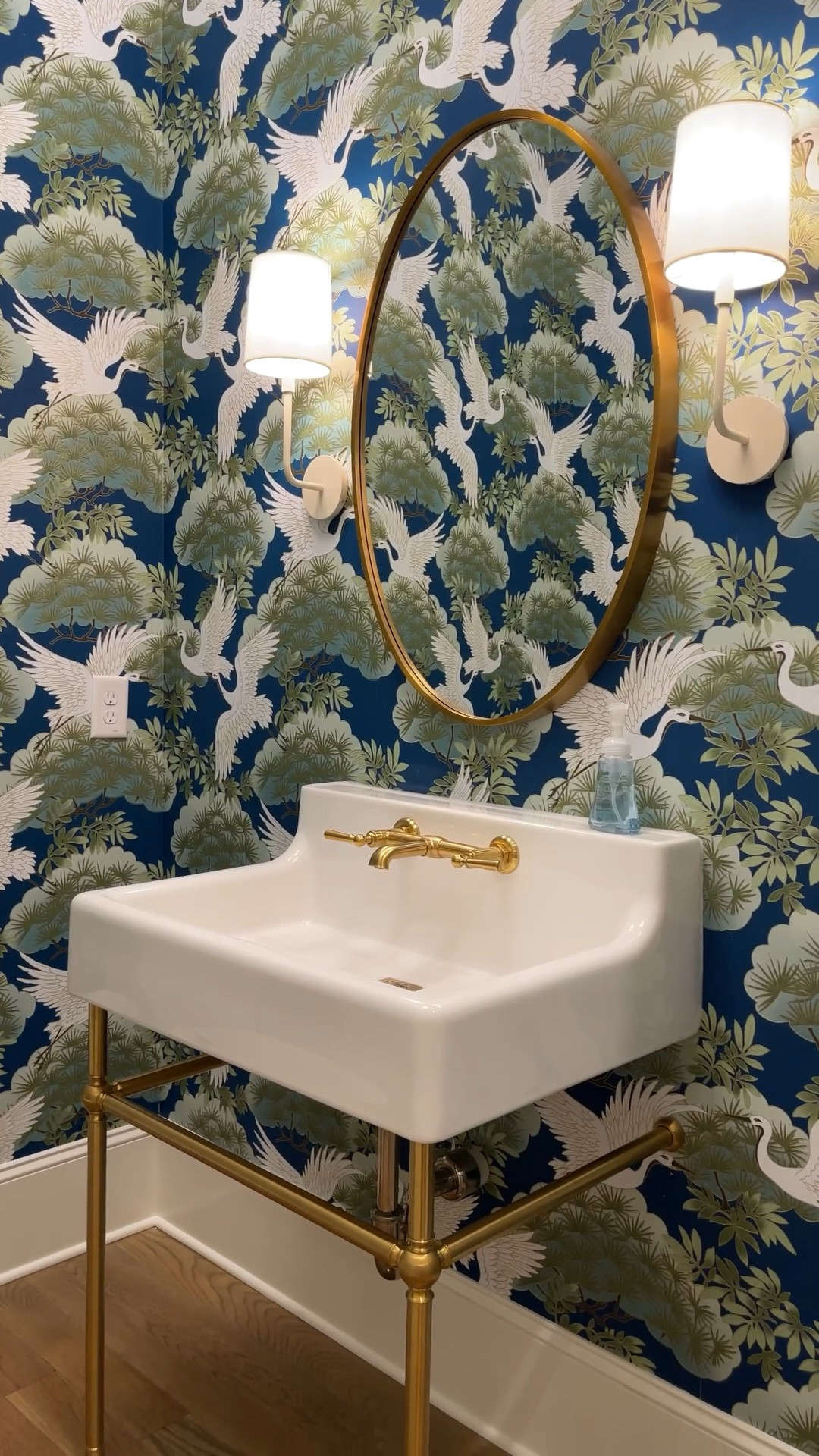 Powder room inspiration! ✨ The Sprig and Heron Wallpaper in Navy is such a statement maker. 💙 The beautiful bird motif and rich navy background instantly add charm, personality, and a collected feel to the space. 🕊️ Paired with a classic console sink, it creates a powder room that feels elegant, timeless, and full of character. 💚 A perfect reminder that small spaces can have some of the biggest design impact. 😍 Linked the wallpaper, vanity, and inspiration sources here! 🙌🏻 #bathroominspo #bathroomvanity #powderroom

#LTKHome #LTKSaleAlert