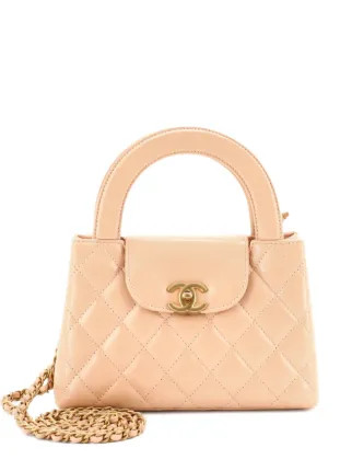 CHANEL Pre-Owned Kelly Top Handle Shopping Bag Quilted Shiny Aged Calfskin Mini Satchel | Neutral... | Farfetch Global