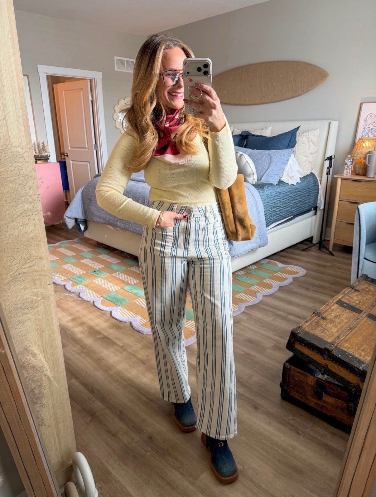 Okay wait… this might be my favorite look lately 🤎

These striped trousers are SO good — flattering high rise, subtle flare, and the vertical stripe makes your legs look miles long. Paired with a fitted knit and a little scarf moment for that effortless, slightly vintage vibe.

It feels polished but still fun. Perfect for brunch, errands, or when you want to look styled without overthinking it.

Fit notes:
• Pants are true to size with a structured feel
• High rise + elongating stripe
• Knit top is fitted (size up if you want a looser fit)

Linking everything here 🤍 This is one of those outfits that makes you feel put together instantly.