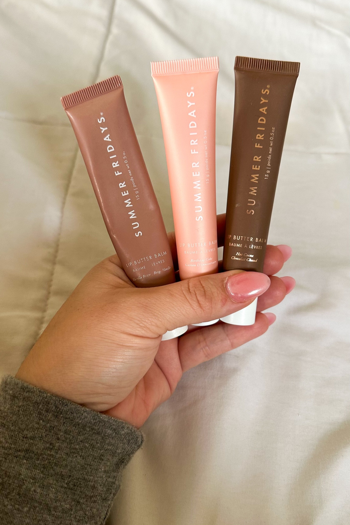 Can you tell I love these? The new birthday cake one is such a pretty pink and smells so good! The hot chocolate one on the right is sold out and was a limited edition in the winter. But vanilla beige was my first and such a good neutral color.

Summer Fridays, lip butter balm, lip balm, limited edition, spring lip combo, pink lip, birthday cake butter balm, Sephora finds, hydrating butter balm

#LTKBeauty #LTKFindsUnder50 #LTKStyleTip