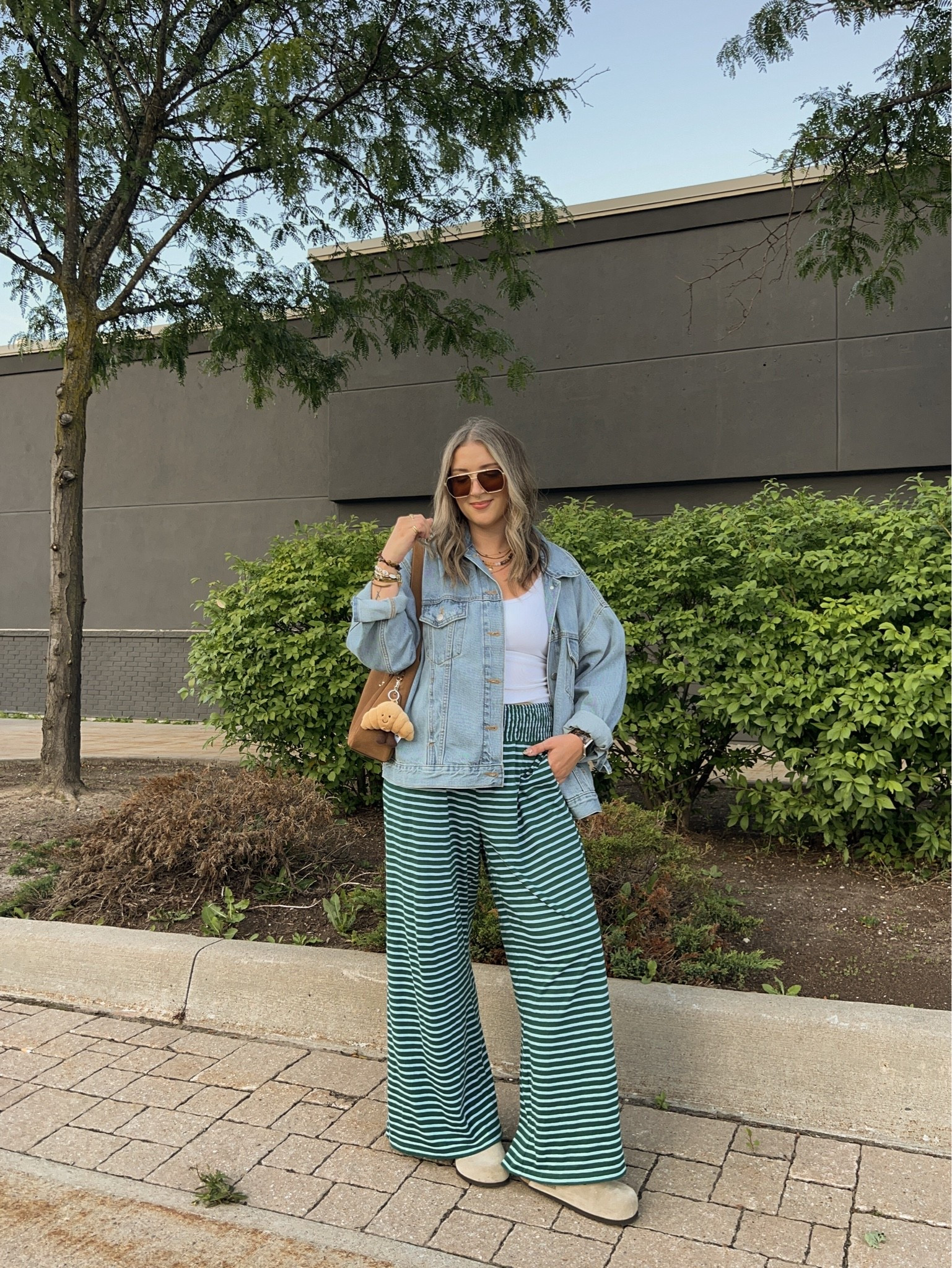 Comfy fall outfit! Wearing M in the bra free tank and L in the striped pants. Also linked similar sweater material pants for cooler weather! Sized up to XL in the denim jacket for an oversized fit. I’m a 9.5-10 shoe and wear a 40 in the Birkenstocks

#LTKfall #LTKsale #LTKstyletip