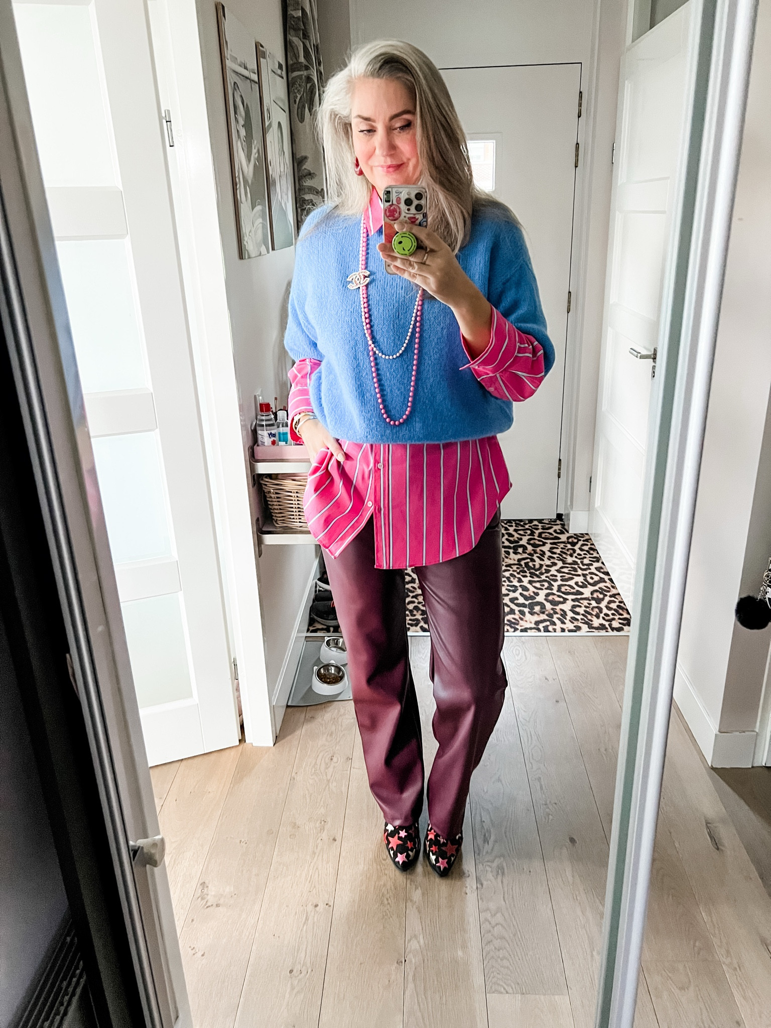 Ootd - Thursday. Oversized pink shirt with blue stripes (Zara, current), short sleeved sky blue wool jumper (Noella), burgundy faux leather pants (Most Wanted), western boots with stars (old), thrifted bead necklaces and CC brooch. 



#LTKnederlands #LTKeurope #LTKFashionMonth
