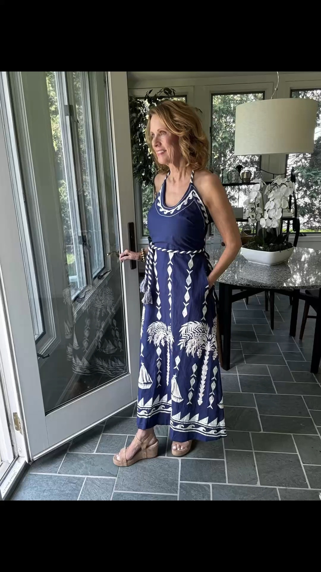 This dress from Spartina checks all the boxes!! It is a lightweight halter dress, has a cute rope belt around the waist and neck and a beautiful summery print!! The back is also smocked plus POCKETS!!

What more could you want!! Val is wearing an XS

#LTKSeasonal #LTKOver40