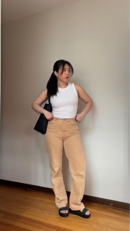Wearing my everyday tank + beige jeans 💛 

Spring outfit ideas, spring style, spring fashion 2024, easy styling, sleeveless tops, vest style, long skirt, tank and jeans, cute outfit ideas, casual style, style content creator, sambas adidas women outfit, spring outfits, beige jeans, travel outfit, vacation outfit, summer outfit 

#ootds #sleevelesstop #springfashion #springoutfits #springstyle #outfitreels #casualstyle #easystyle #springoutfitideas 

#LTKSeasonal #LTKfindsunder50 #LTKstyletip