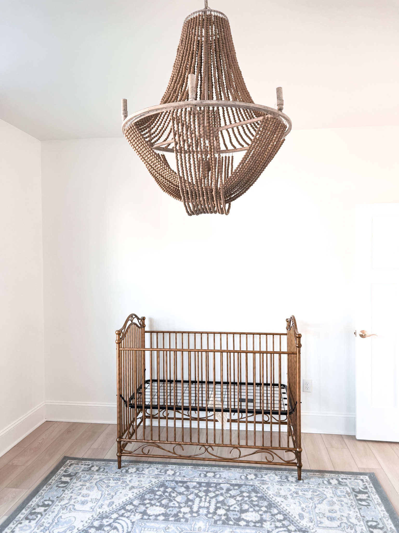 million dollar baby camellia crib
Brass crib
Gold crib
Wood bead chandelier
Mystic sand kayla chandelier
Boho chandelier
Blue and beige rug


#LTKhome #LTKbaby #LTKunder50