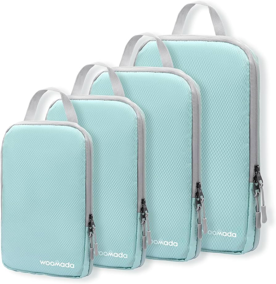 WOOMADA Compression Packing Cubes for Suitcases Travel Essentials 4 Set Expandable Travel Bags Or... | Amazon (US)