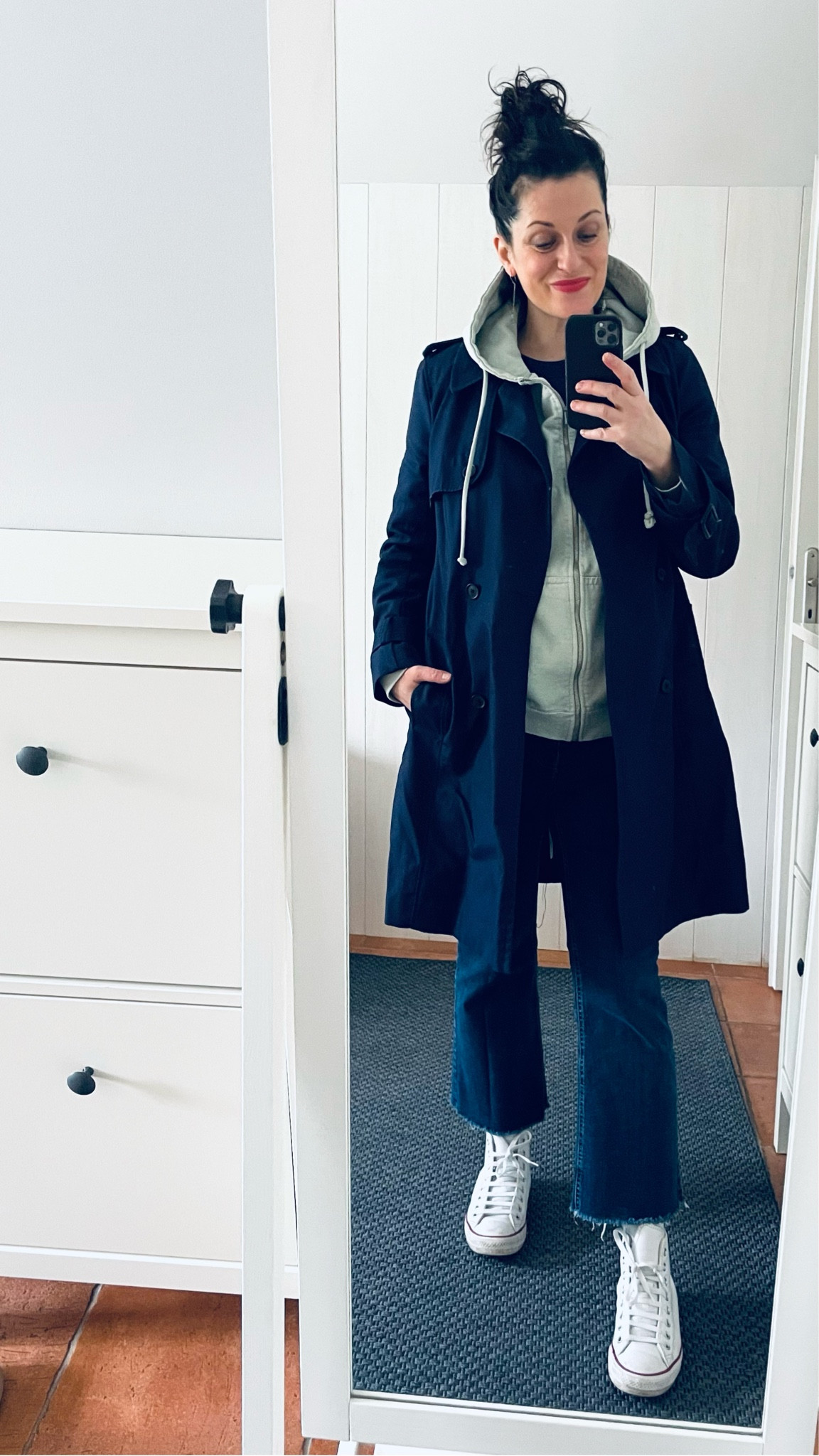 Pinky red lipstick #rouje
Navy trench-coat #cyrillus
Aqua green hoodie #pullandbear
Navy heavy cotton boyfriend tee #fruitoftheloom
Flare cropped jeans #mango
White leather high tops #converse #chucktaylor 
Turquoise earrings #etsy

#LTKbeauty #LTKover40 #LTKmidsize