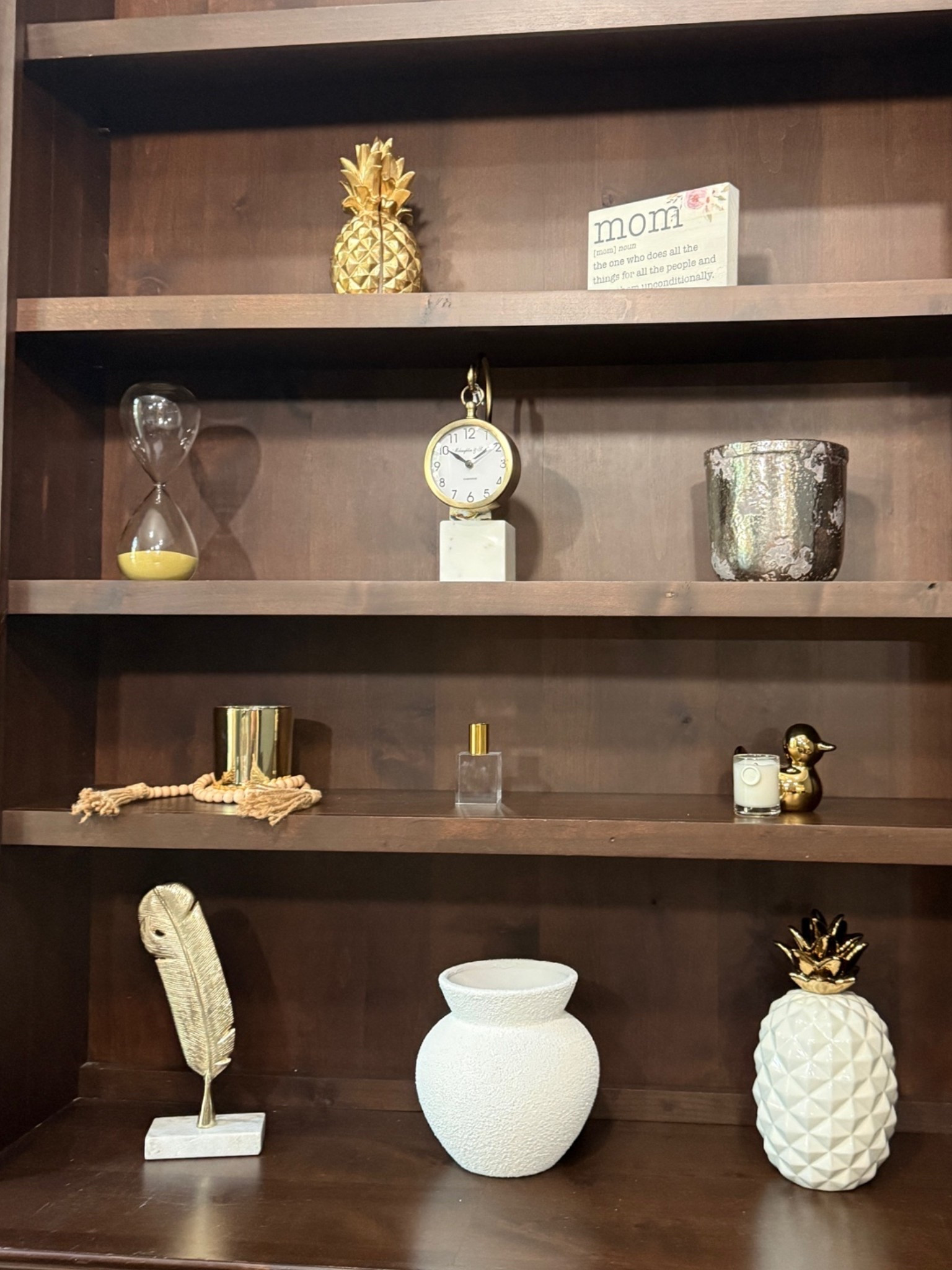 Part two of my office decor! Which one is your favorite? I love that each thing represents my brand from the clock to the pineapple to the feathered pen. I hope this inspires you to decorate your home office.

#LTKdayinmylife #LTKmomlife #LTKHome