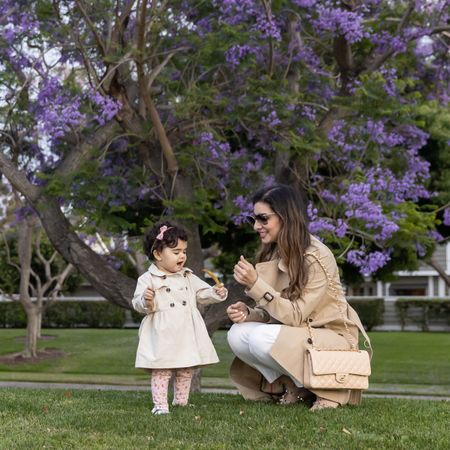 Mommy and daughter matching look. Burberry trench coat with H&M baby jacket.
