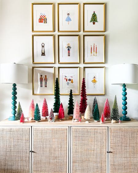 Colorful Christmas art, entryway decorated for Christmas, bottlebrush trees, cane console table, nutcracker art, Christmas art, Christmas Decor 

#LTKhome #LTKHoliday #LTKSeasonal