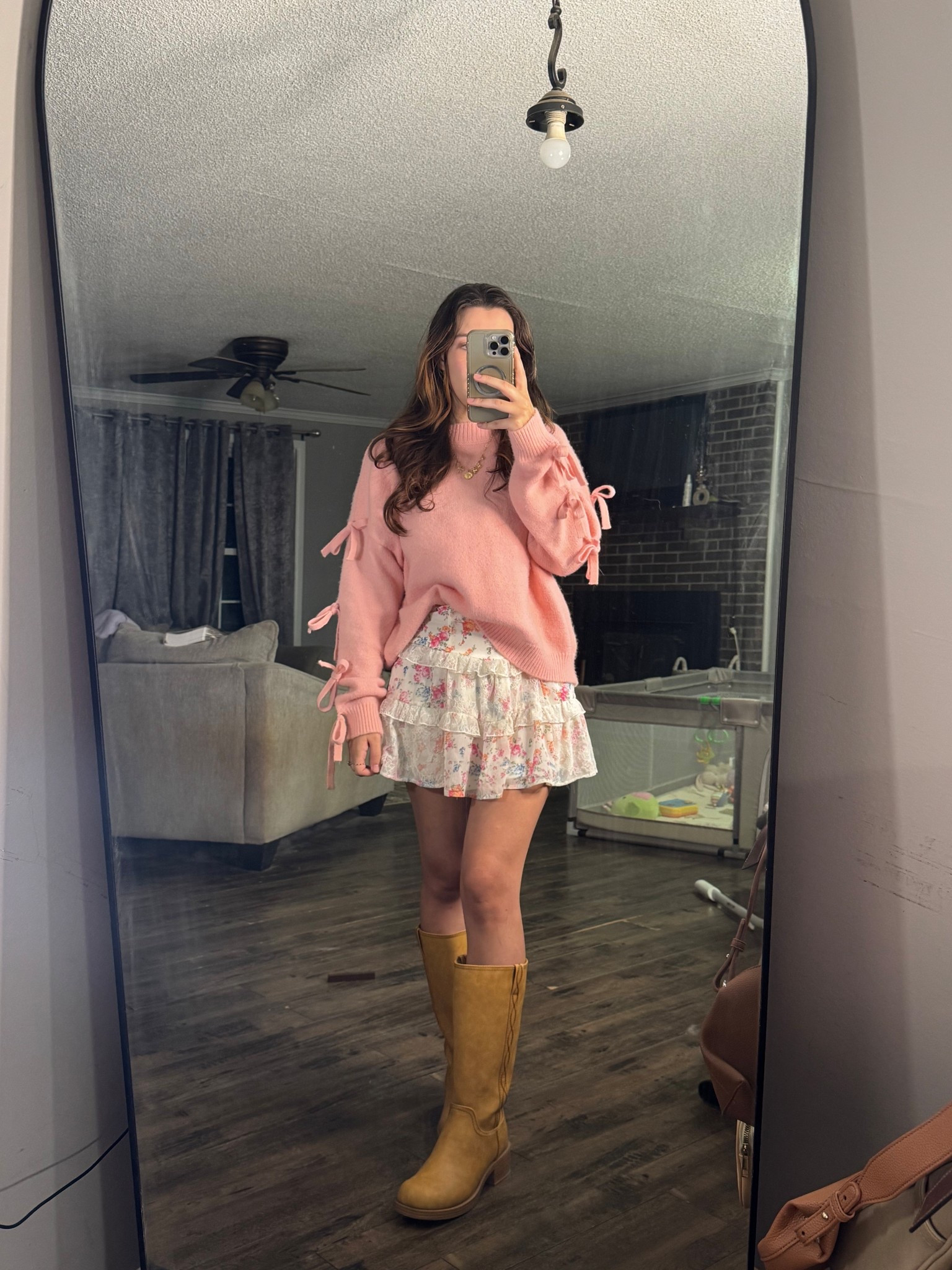 Pink sweater and white lace mini skirt with boots outfit! This exact top is from fashion nova and the skirt is from altard state! 

#LTKStyleTip #LTKShoeCrush #LTKFindsUnder50