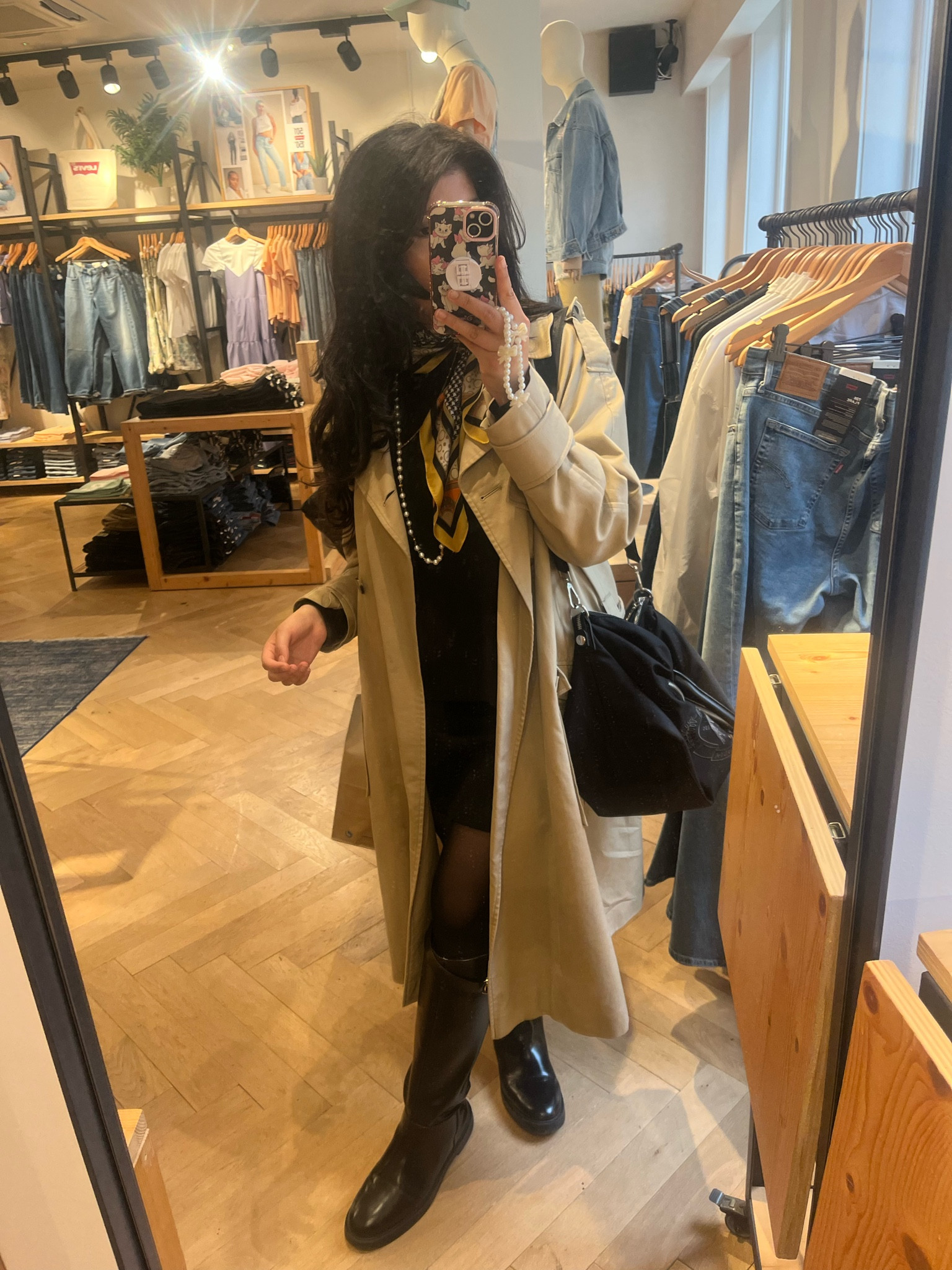 Quick outfit of the day whilst shopping! 
Love this beige trench coat 
Black mini skirt 
Black jumper 
Black knee high boot 
Coloured neck scarf 
Ralph Lauren bag 
Pearl necklace 

#LTKBacktoSchool #LTKworkwear #LTKSeasonal