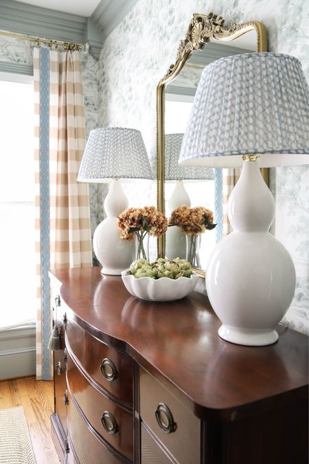 Two double-gourd lamps and a scalloped bowl of faux artichokes decorate my dining room buffet. 

#LTKhome