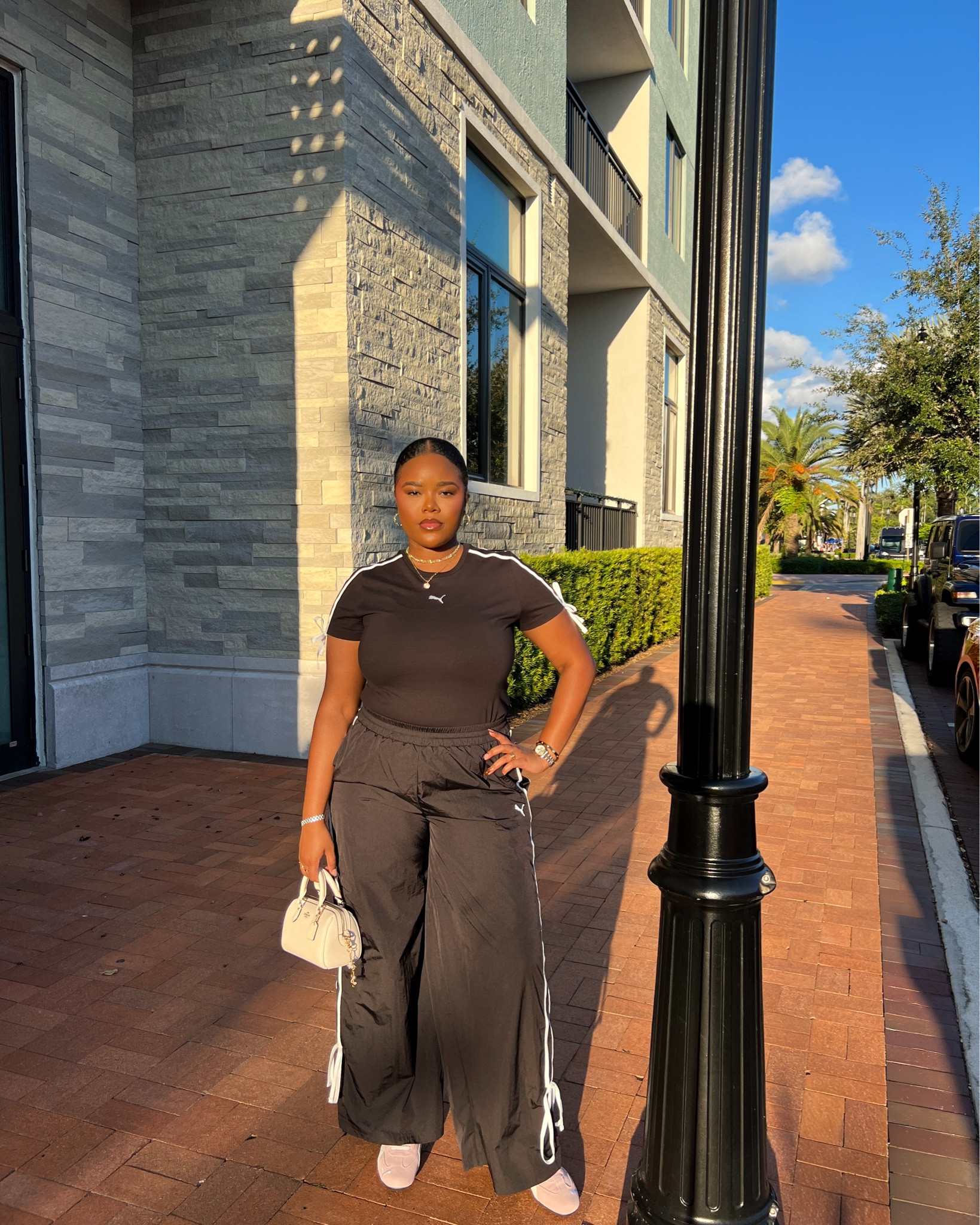 A comfy black and white outfit with bow ties. Comfortable everyday wear for fall / autumn. Pink and white sneakers #fallfashion #blackandwhiteoutfit #autumnfit #comfyoutfit #pumaoutfit

#LTKFindsUnder100 #LTKShoeCrush #LTKStyleTip