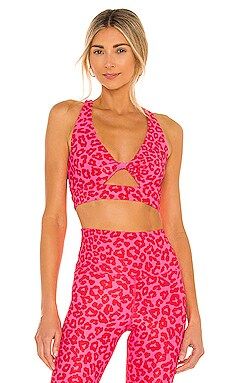 BEACH RIOT Twist Sports Bra in Famous High Risk Red Leopard from Revolve.com | Revolve Clothing (Global)