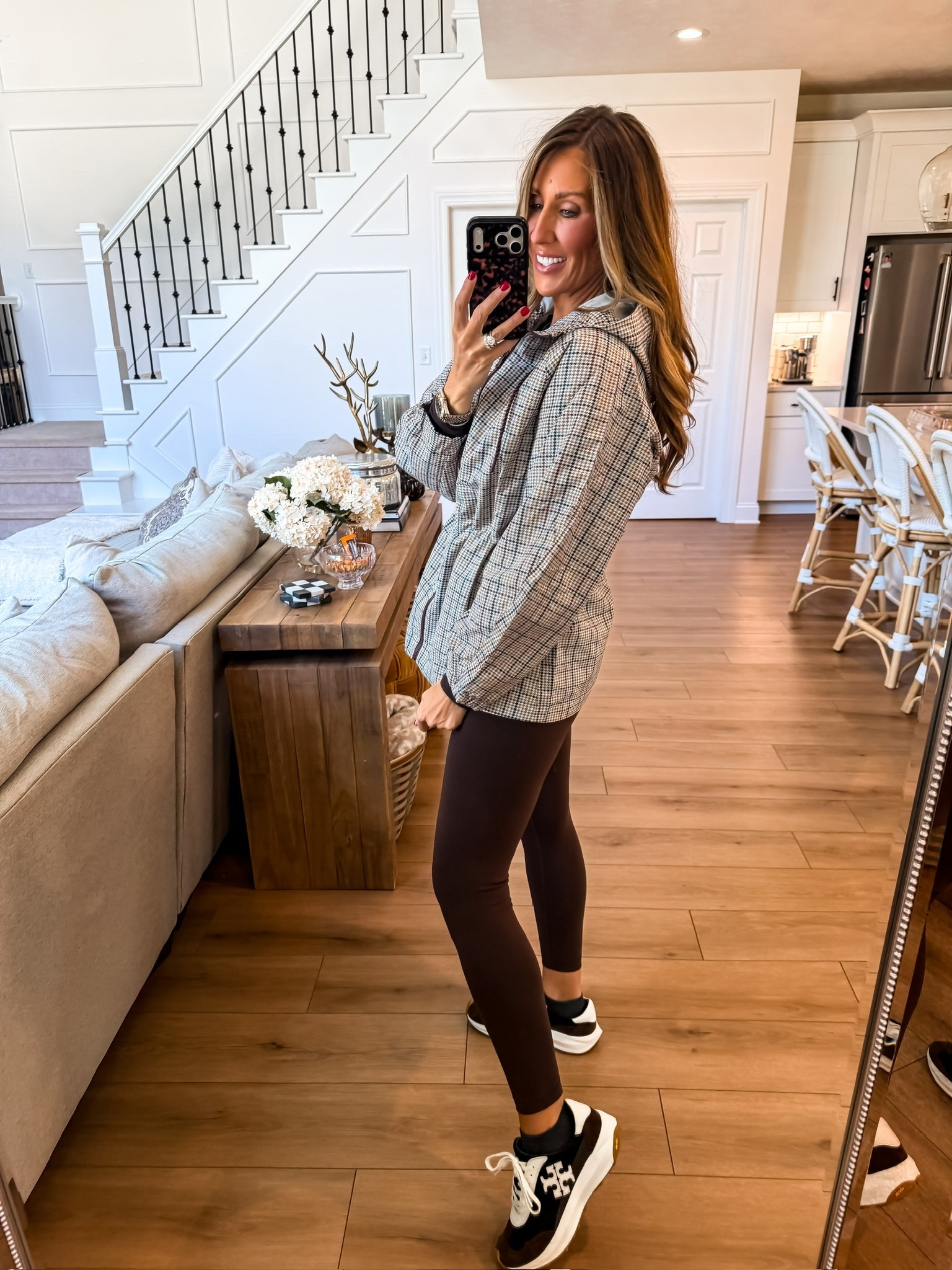 This plaid hooded jacket is such a good lightweight layer for fall. I love it with chocolate brown leggings and sneakers for errands, travel days, or those cooler mornings when you want something easy to throw on and go.

plaid jacket, hooded fall jacket, brown leggings, casual fall outfit, fall athleisure, lightweight fall layer, sneakers outfit, women over 40 style, themominstyle

#LTKootd #LTKOver40 #LTKSeasonal