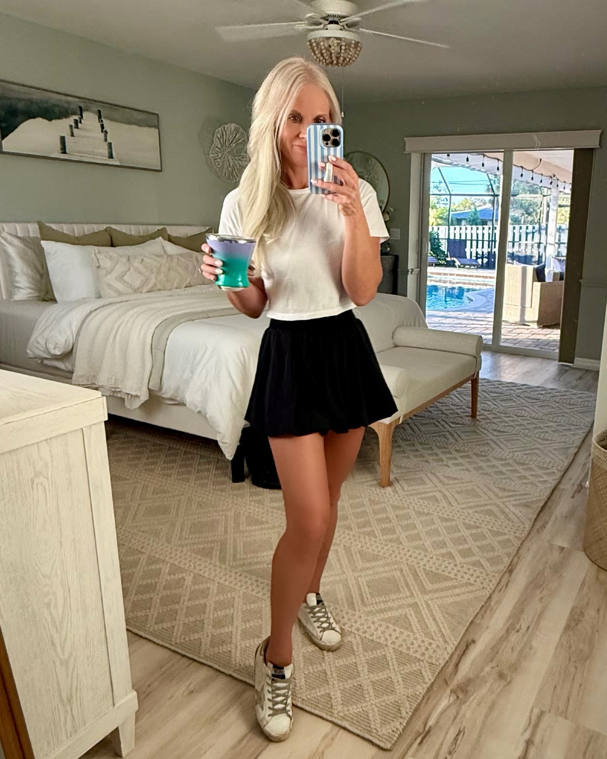 My husband said “you look adorable” so I thought I’d share! Both pieces are very affordable - I’m wearing XS in skort and top. 

Casual cute outfit / bubble skirt / crop top / black and white 

#LTKActive #LTKFindsUnder50 #LTKStyleTip