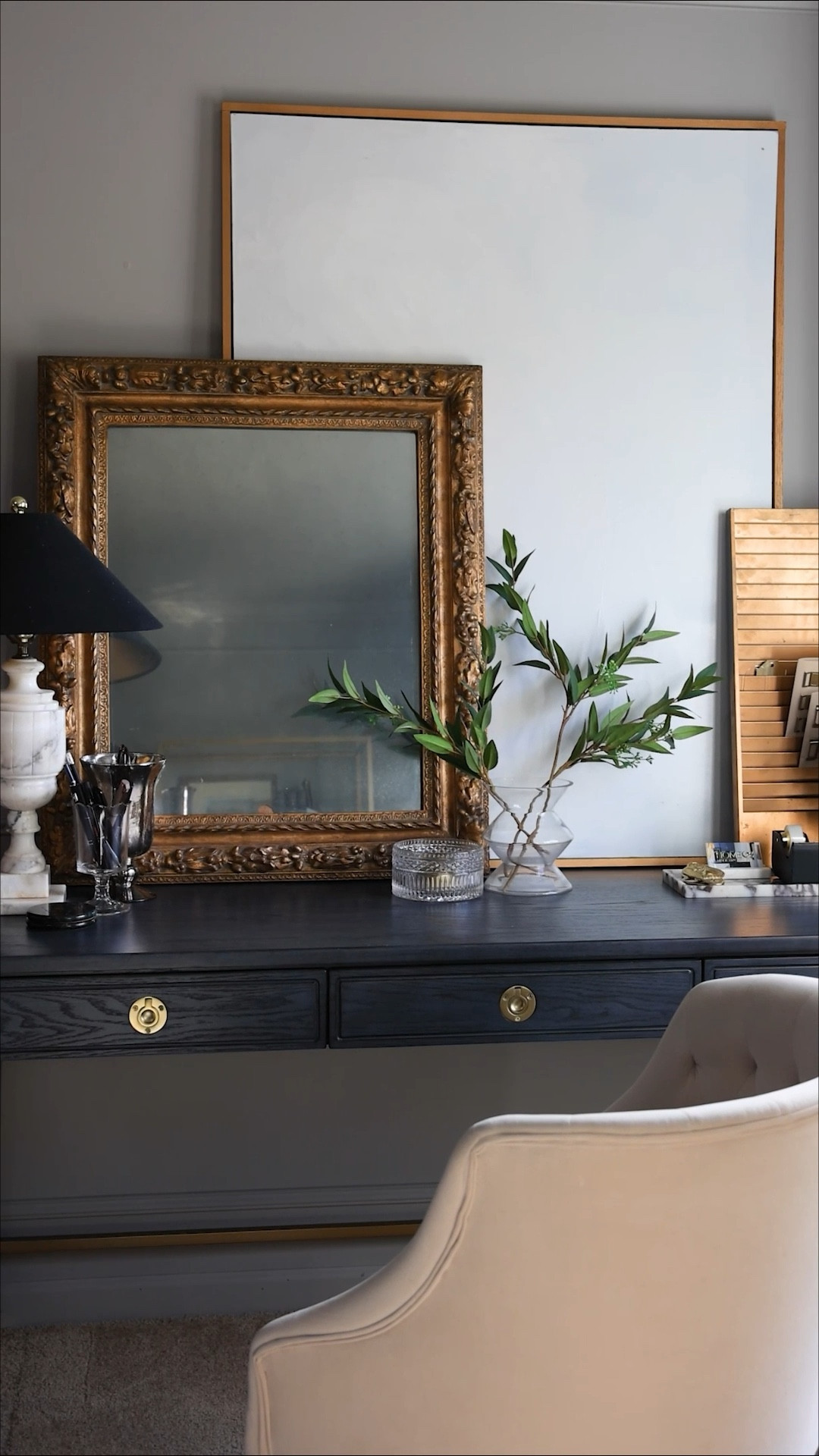 Office workspace | Beautifully outfitted with a navy desk, comfy desk chair, and practical organization solutions that are also prettyy

#LTKHome