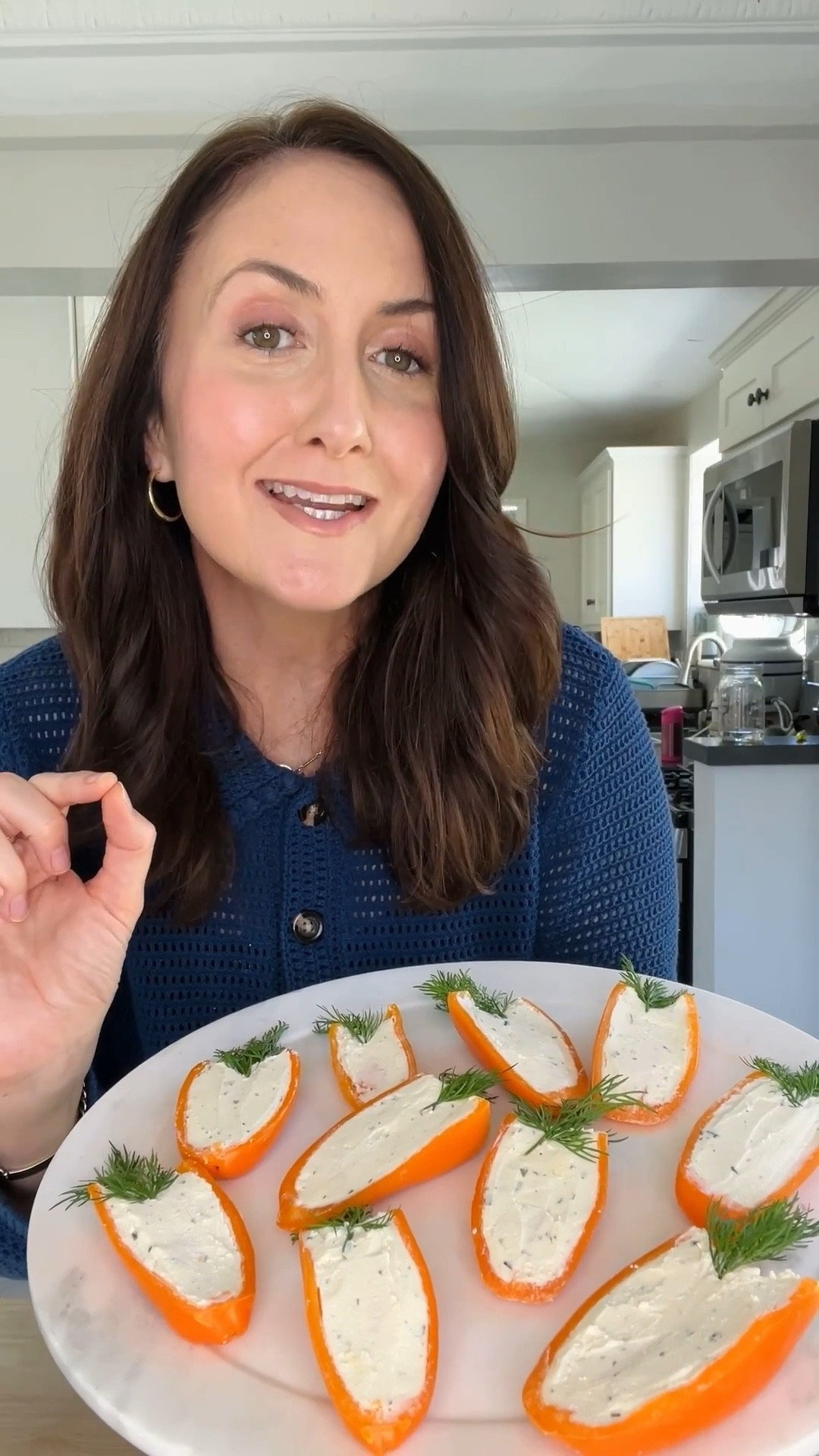 Make this for Easter or any other spring occasion 🥕

INGREDIENTS
5 orange mini bell peppers
1 (5.3oz) Boursin cheese
10 dill sprigs

INSTRUCTIONS
1. Slice off top of bell peppers, and then slice in half (lengthwise), and add ½ oz of boursin to each halved pepper.
2. Press dill into the top of the bell pepper, into the cheese.
3. Arrange on a platter and enjoy!

#LTKSeasonal #LTKfoodie