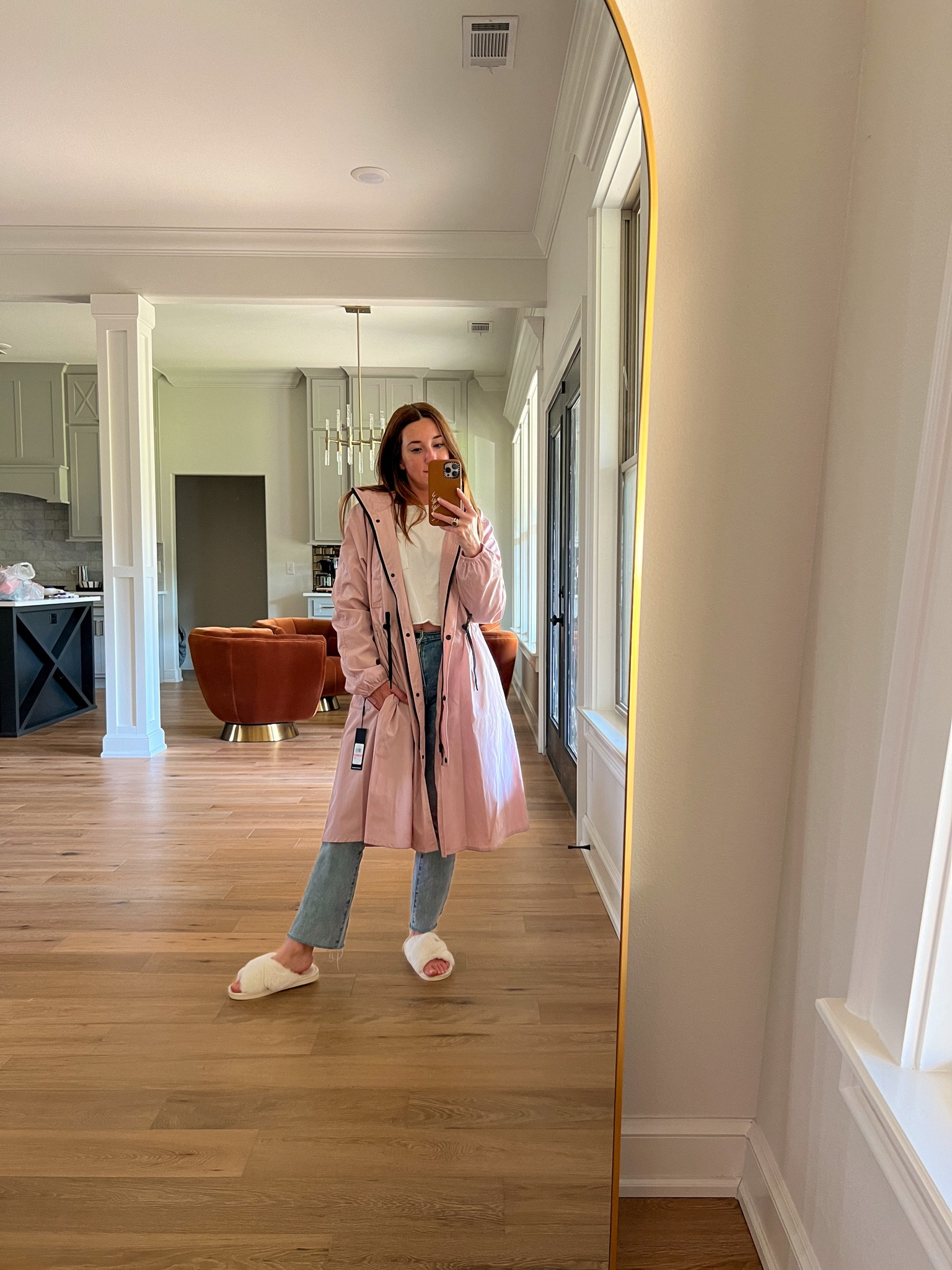 This rain jacket from the Nordstrom Sale!  ☔️ The pink color lends almost neutral - more of a sweet blush tone. The hood zips into the collar so you don’t have to wear it out if it’s not raining. The waist cinches and it’s so flattering! Also comes in tan. I’m wearing an XS fits tts.

Rain jacket, layering, capsule 

#LTKworkwear #LTKxNSale