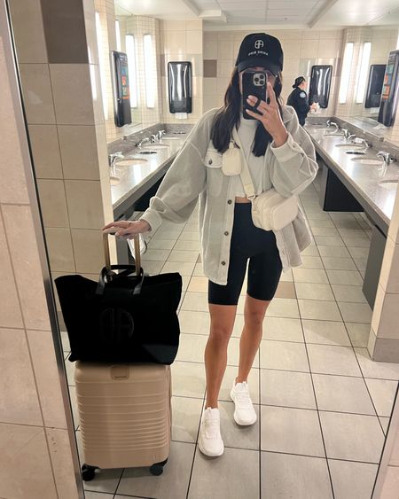 Ruby jacket: sized down to XS 
Crop tee: sized up to a 6
Biker shorts: sized up to a 6
Cloud sneakers: true to size 

Crossbody is old from Target, tote is Anine Bing. 
Travel outfit. Airport look. Lululemon. Luggage. 

#LTKCon 

#LTKunder100 #LTKtravel