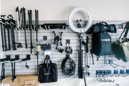 Who said slat wall garage systems were only for things like yardwork tools?! We love purposing tried-and-true systems to fit the needs of a project, and this wall ended up being perfect for our clients video & photography equipment! 📸 

Our team really focuses on thinking outside of the box using our creativity and accumulated wisdom from working with so many different types of clients and projects - one of the true indicators of experience is not always assuming a space has to be what it always has been. Which is what makes our job so much fun!