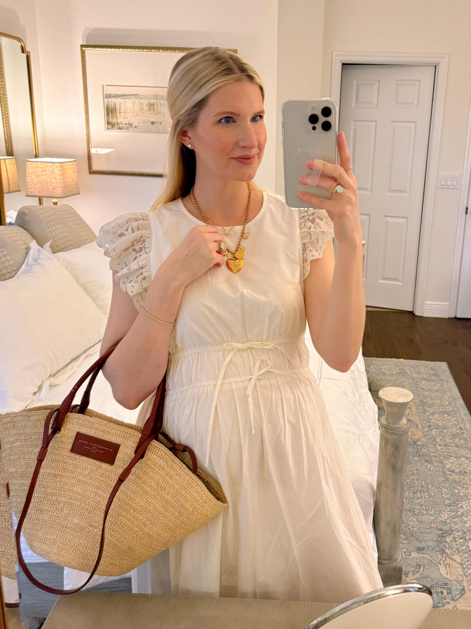 Ivory organic cotton dress, lace detailing, bump friendly. The perfect sized straw bag! 

#LTKSeasonal #LTKbump #LTKtravel
