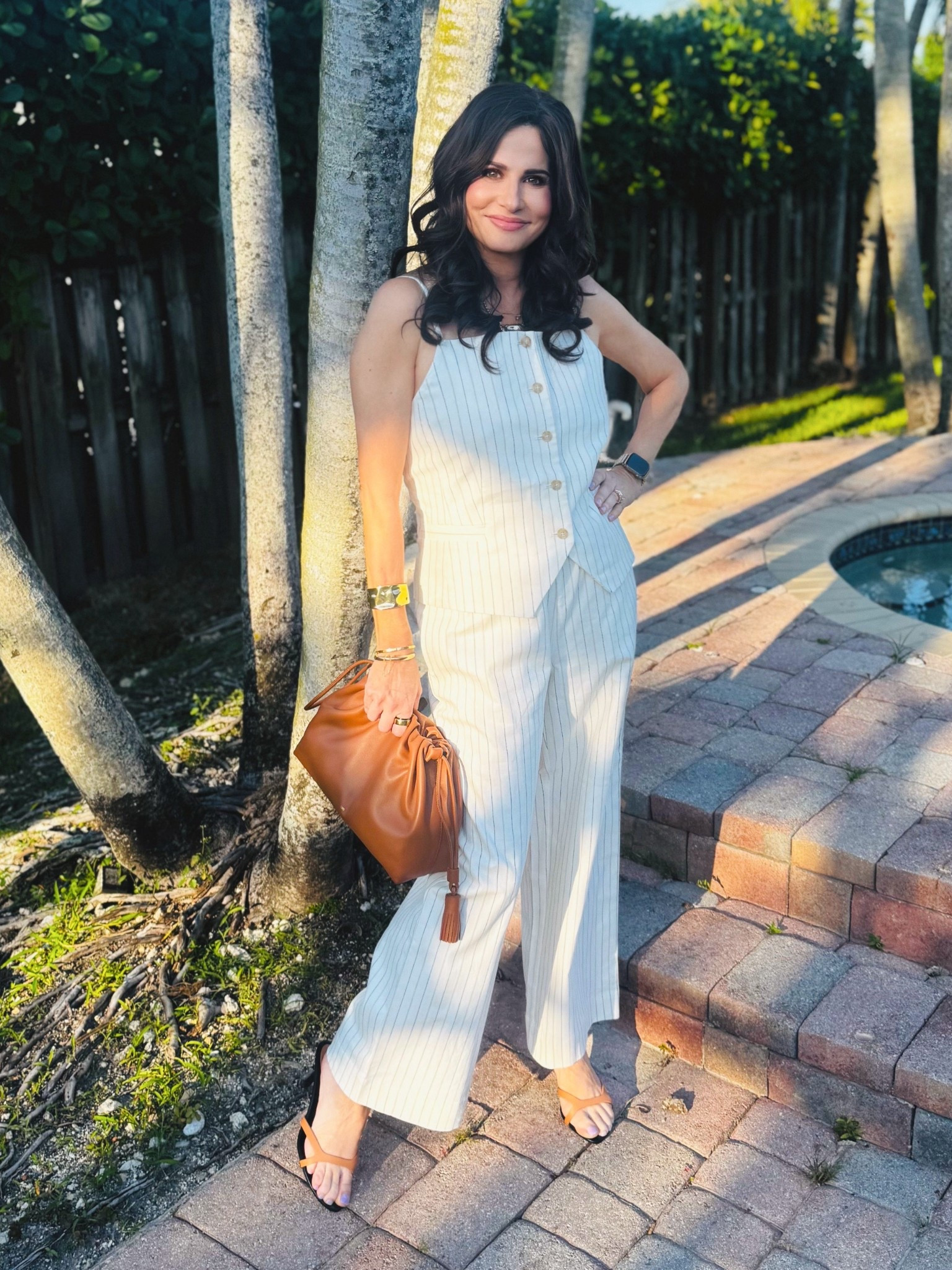 This two piece set / sold separately. I find this set to be so versatile. Has black and brown pinstripes. Pants xsp, top size 6 but could have sized down 2. There is smocking in the back and straps are adjustable. #springset #pantset 

#LTKSaleAlert #LTKOver40

#LTKSeasonal #LTKPetite #LTKSaleAlert