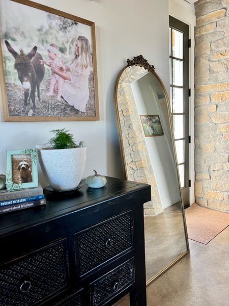 Entryway views. The perfect console, mirror and table books 

#LTKhome #LTKstyletip #LTKSeasonal