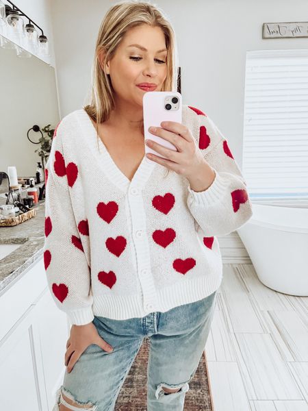This heart cardigan is from SHEIN - it’s unfortunately sold out at the moment but I linked another color and some more cute options 
I’m in size 1xl and it fits comfy and oversized 
Jeans are old navy size 16 

#valentinesday

#LTKstyletip #LTKcurves