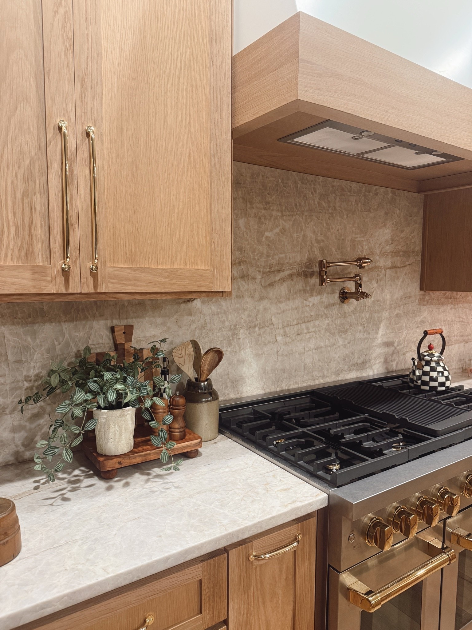 Kitchen inspo | cabinet hardware | zline appliances | counter styling | Mackenzie Childs | faux florals | target | threshold | magnolia | vintage | utensil holder | wooden spoons | checkered cutting board | pot filler | tea pot | polished gold | wood riser | Kirklands | 12 inch cabinet hardware | amazon cabinet hardware | cabinet handles | stove vent | Taj Mahal | modern organic home |white oak cabinets |

#LTKHome