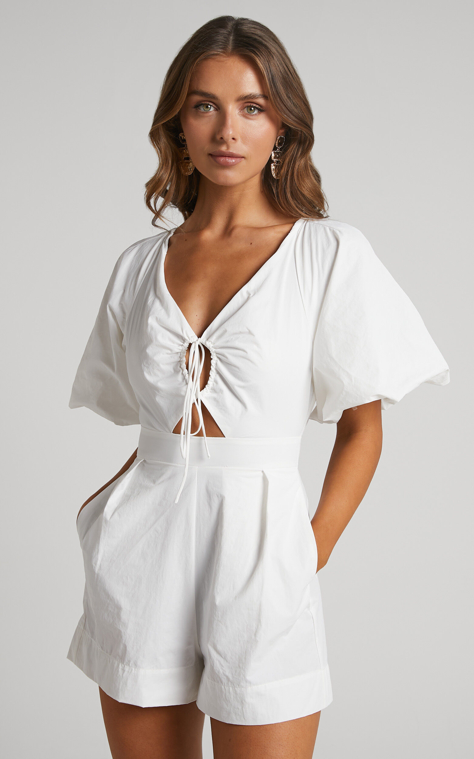 Khirara Playsuit - Tie Front Cut Out Puff Sleeve Playsuit in White | Showpo (US, UK & Europe)