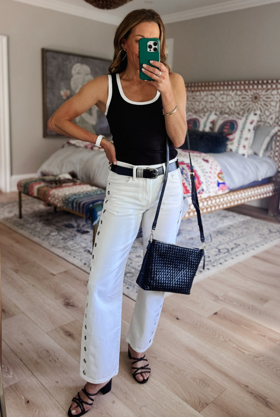 A black and white combo is never boring. This look is easy and wearable, but the grommet detail on the jeans gives it that extra little something that makes it feel special!  

 #LTKootd #LTKmomlife #LTKSeasonal