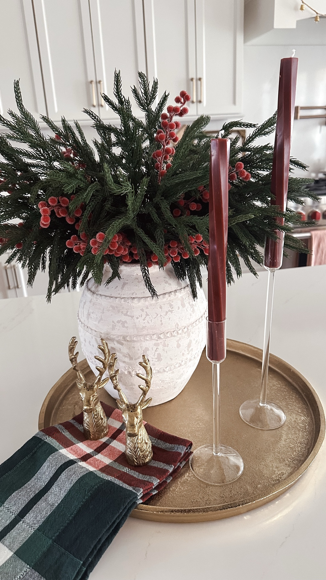 Christmas Centerpiece, holiday centerpiece, Christmas kitchen, holiday kitchen, Christmas florals, gold tray, glass candleholders, burgundy candles, Christmas kitchen towel, gold salt and pepper shakers, deer salt and pepper shakers 

#LTKHome #LTKHoliday
