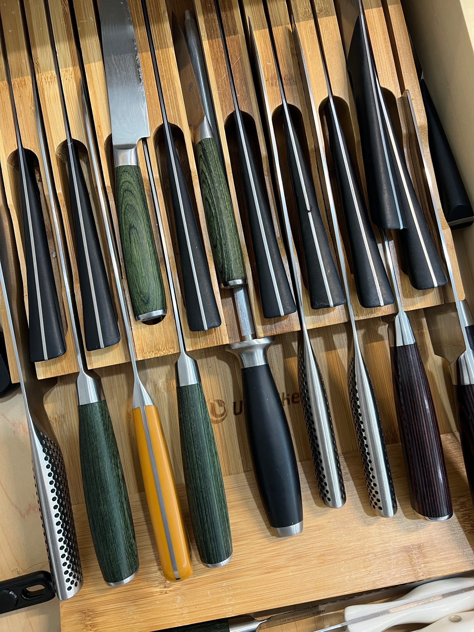 This bamboo knife organizer is perfect for storing your knives safely tucked away in a drawer and saving counter space.

#LTKFindsUnder100 #LTKHome #LTKFindsUnder50