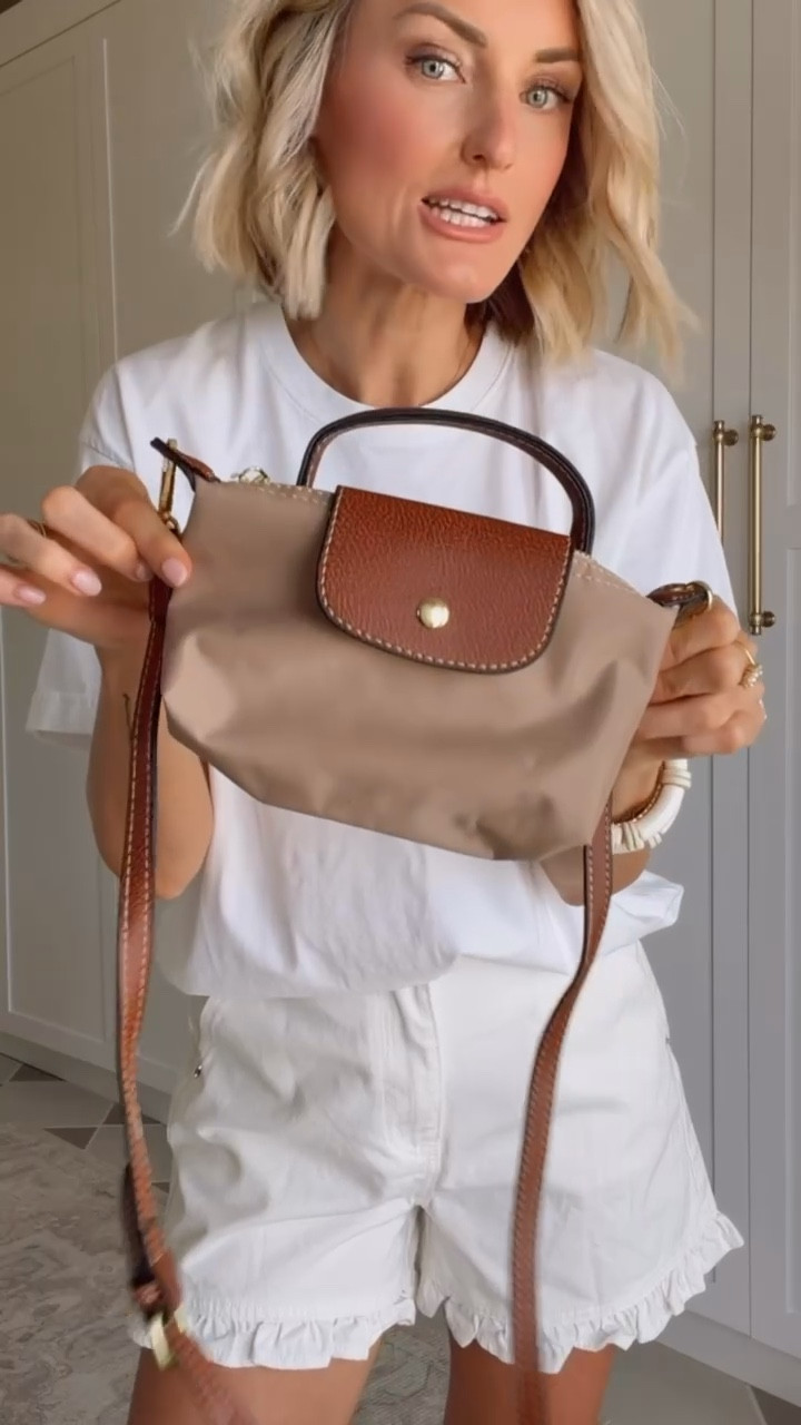 This mini crossbody is so versatile! Perfect for if you just want to carry around a few essentials- plus it fits your phone! Also the straps are removable so you can use it as a mini cosmetics/accessory pouch in your tote! Wearing S/6

Loverly grey, longchamp inspired le pliage pouch, Amazon style finds, affordable accessories, finds under 20

#LTKSeasonal #LTKmomlife #LTKBeauty