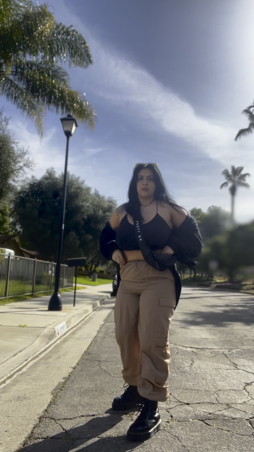 MUA work fit, comfy over sized button up black cross body crop top, beige pants, doc martens, savage & fenty Fanny pack w/ green sunnies 

#LTKSeasonal #LTKstyletip #LTKbeauty