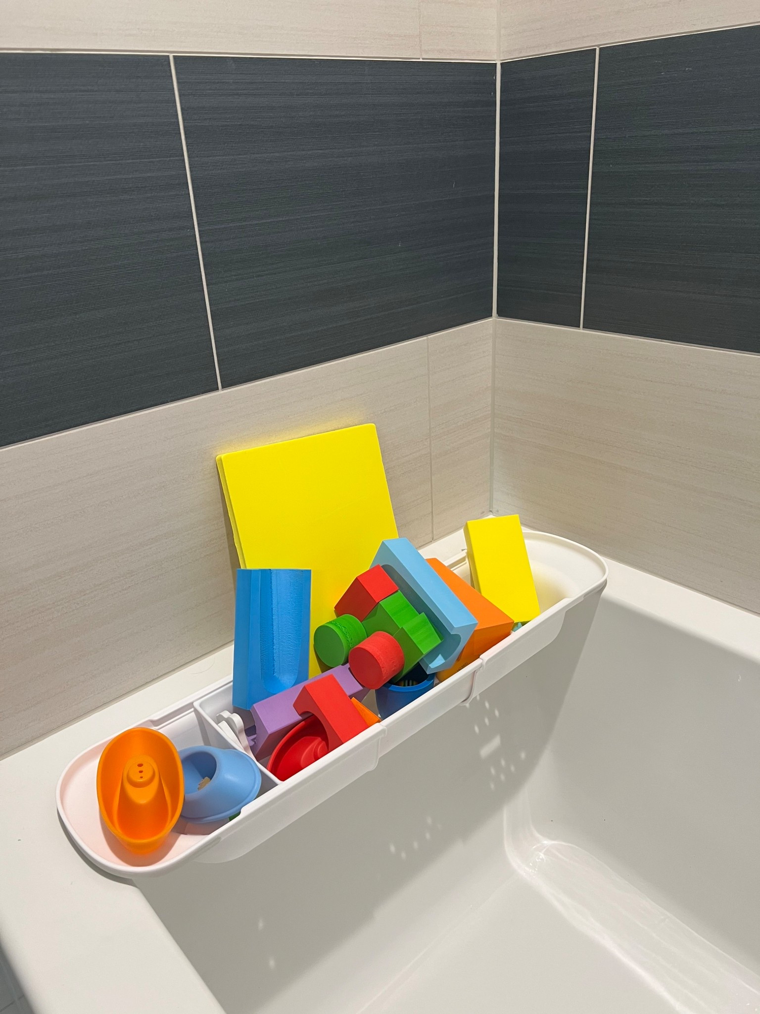 The best bathtub organizer! It has drains, adjusts to your tub width and holds a ton.

#bathtub #kids #organization #target #targethome 

#LTKHome #LTKBaby #LTKFamily