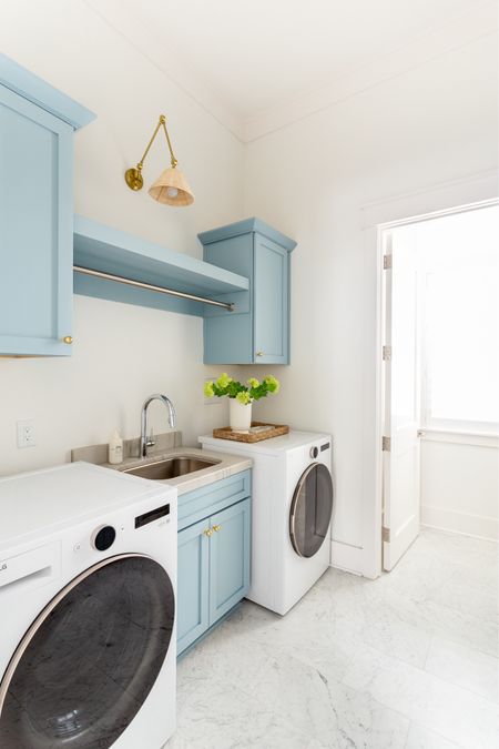 Our laundry room and pantry space featuring our brass cabinet hardware, rattan sconce (with a rechargeable light bulb), my favorite faux viburnum stems, a cream ceramic vase and a woven tray. Read more about battery operated lights and rechargeable lamps here: https://lifeonvirginiastreet.com/rechargeable-light-bulbs-lamps/.
.
#ltkhome #ltkfindsunder50 #ltkfindsunder100 #ltkstyletip home hacks, lighting tips, rechargeable light fixtures, laundry room decorr

#LTKhome #LTKSeasonal #LTKfindsunder50