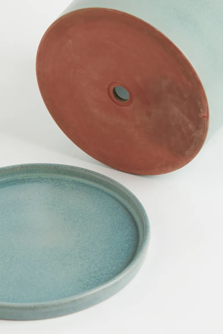 Large plant pot in glazed terracotta with a drainage hole at base. Matching saucer. Diameter of s... | H&M (US + CA)