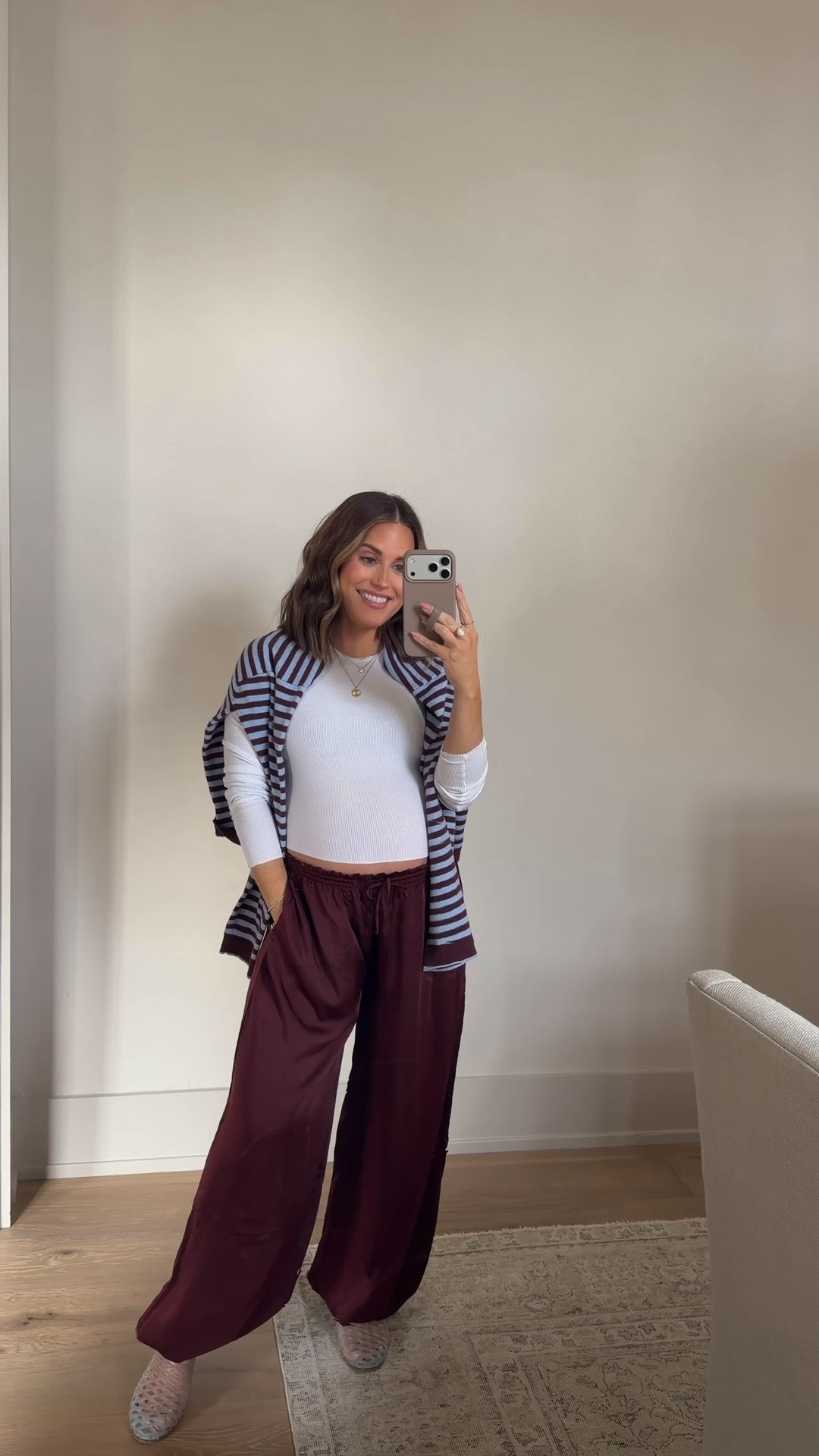 Casual weekend outfit! Wearing an xs in these satin balloon pants (this color!!), small in ribbed tee, & small in cardigan. I just draped it over my shoulders as an extra layer. I thought these slip on jellies matched the blue in the cardigan, but you could also do a casual sneaker. Slides currently $34 (reg $90). 

These pants can easily be dressed up with a kitten heel + nice top. 

Currently 38 weeks pregnant. Maternity, bump friendly, pregnant

#LTKBump #LTKmomlife #LTKootd