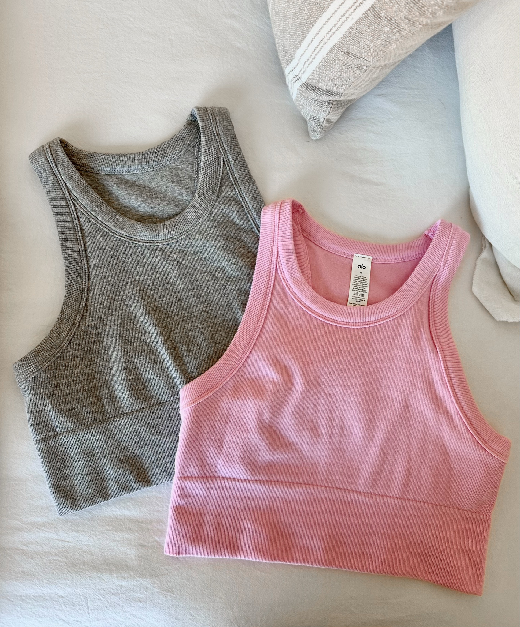 love these tanks! the pink is sold out but they have several other colors. 

alo yoga clothing, women’s active wear

#LTKFindsUnder100 #LTKFitness #LTKActive