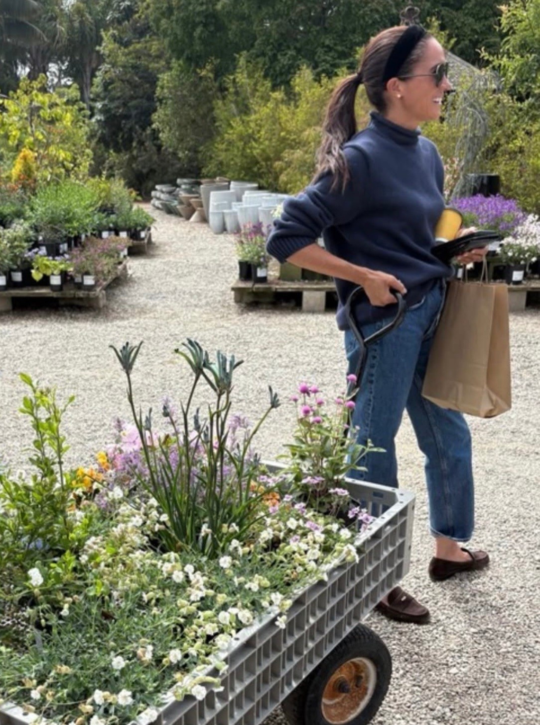 NEW! Meghan the Duchess of Sussex￼shared a photo on her stories shopping for flowers. She wore her favorite role neck 1988 cotton sweater velvet headband suede loafers ￼