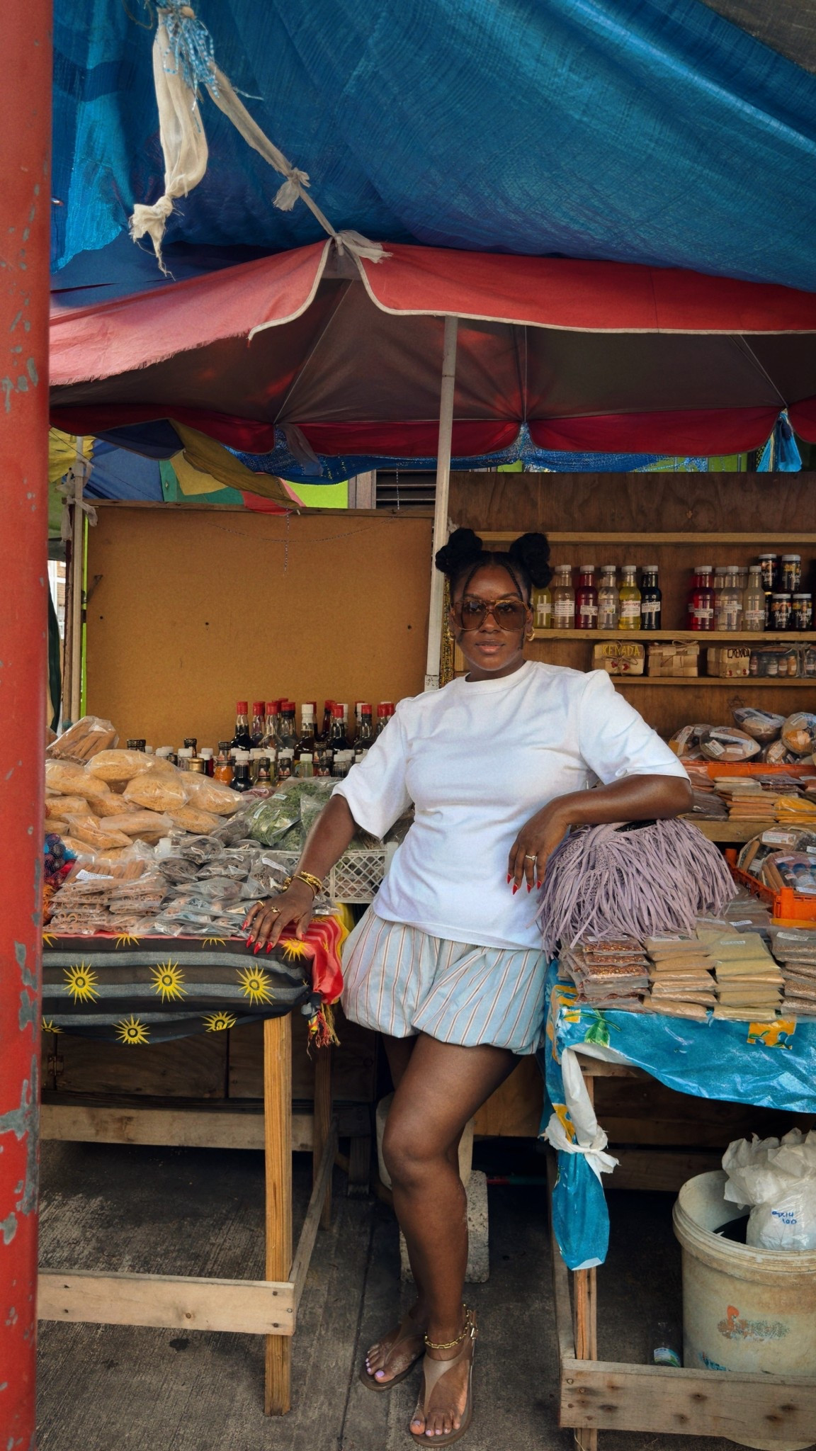 White shoulder pad tshirt and bubble shorts with jelly sandals